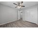 Bright bedroom with ceiling fan and large closet at 4795 S Yank Way, Morrison, CO 80465