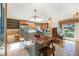 Updated kitchen with a central island, stainless steel appliances, and plenty of cabinet space at 10490 W 78Th Ave, Arvada, CO 80005