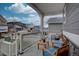 Inviting front porch featuring comfortable seating, offering a cozy outdoor space at 1031 Turnberry Cir, Louisville, CO 80027