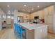 Bright, open kitchen featuring a center island, stainless steel appliances, and light wood cabinetry at 1031 Turnberry Cir, Louisville, CO 80027