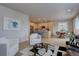Spacious living area flows into the bright kitchen and dining area creating an open and inviting living space at 1031 Turnberry Cir, Louisville, CO 80027