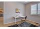Bright home office featuring a contemporary desk setup and comfortable seating, ideal for focused work or study at 1031 Turnberry Cir, Louisville, CO 80027