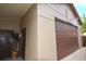 The exterior of a three car garage features ample storage space and a basketball hoop at 11823 Williams Way, Northglenn, CO 80233