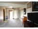 Spacious living room with carpeted floors and sliding door access to the outside at 11823 Williams Way, Northglenn, CO 80233