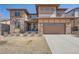 Beautiful two-story home with a two car garage, stone accents, and an inviting front yard at 7994 S Kewaunee St, Aurora, CO 80016