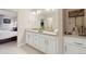 Contemporary bathroom with double sinks, ample counter space, and stylish decor for a luxurious feel at 16400 Alberta Dr, Parker, CO 80134