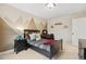 Inviting bedroom featuring mountain mural, dark wood furnishings and a comfortable layout at 16400 Alberta Dr, Parker, CO 80134