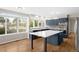Modern kitchen with an island, stainless steel appliances and a view overlooking outside at 3205 S Tulare Ct, Denver, CO 80231