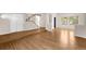 Bright and spacious living room featuring hardwood floors, staircase and natural light at 3205 S Tulare Ct, Denver, CO 80231