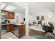 Kitchen area with stainless steel appliances, granite countertops and an eat-in area at 670 Winona Ct # 38, Denver, CO 80204