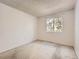 Bedroom with carpet and window at 4400 S Quebec St # M-204, Denver, CO 80237