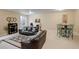 Spacious living room with a leather sofa, area rug, and accent table at 1060 Arrowhead Ct, Erie, CO 80516