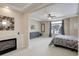 The main bedroom features a fireplace and a large window at 1060 Arrowhead Ct, Erie, CO 80516
