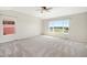 Spacious bedroom featuring a large window with scenic views and plush carpeting at 11748 Mill Valley St, Parker, CO 80138