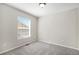Cozy bedroom offering neutral decor, soft carpet, and pleasant view at 11748 Mill Valley St, Parker, CO 80138