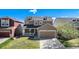 Charming two-story home with a spacious front yard, a covered porch, and a two-car garage at 11748 Mill Valley St, Parker, CO 80138