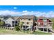 A view of the back of the home with a deck and stairs leading down to the yard with a wood fence at 11748 Mill Valley St, Parker, CO 80138