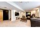 Open basement with media center, and a comfortable seating area for relaxing and entertaining at 6762 Eagle Pl, Highlands Ranch, CO 80130