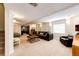 Large basement Gathering room with dark leather seating, recessed lighting and carpet at 6762 Eagle Pl, Highlands Ranch, CO 80130