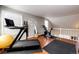 This home gym features exercise equipment and hardwood floors at 6762 Eagle Pl, Highlands Ranch, CO 80130