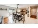 Open dining area with access to the kitchen and outdoor seating area at 6762 Eagle Pl, Highlands Ranch, CO 80130