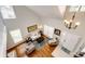 Bright living room with vaulted ceilings, hardwood floors, and abundant natural light at 6762 Eagle Pl, Highlands Ranch, CO 80130