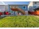 The exterior features a private backyard, deck, and stairs at 19884 E Villanova Pl, Aurora, CO 80013