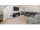Spacious living room featuring plush carpeting, vaulted ceilings, fireplace and eat in kitchen at 19884 E Villanova Pl, Aurora, CO 80013