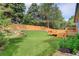 Spacious backyard with a wooden deck, perfect for outdoor entertaining and relaxation at 354 Willowick Cir, Highlands Ranch, CO 80129