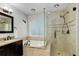 Primary bathroom features granite countertops, soaking tub, and glass enclosed shower stall at 354 Willowick Cir, Highlands Ranch, CO 80129
