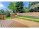 Inviting wooden deck with railing, offering an ideal space for outdoor gatherings and relaxation at 354 Willowick Cir, Highlands Ranch, CO 80129