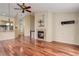 Open-concept living area showcases hardwood floors and a seamless connection to the kitchen at 354 Willowick Cir, Highlands Ranch, CO 80129