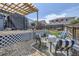 Inviting backyard features a deck, patio, fire pit, and seating, ideal for outdoor gatherings and relaxation at 537 N 48Th Ave, Brighton, CO 80601