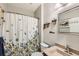 Cozy bathroom with floral shower curtain, and sink at 537 N 48Th Ave, Brighton, CO 80601