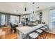Modern kitchen boasting gray cabinets, stainless steel appliances, and a center island with bar seating at 537 N 48Th Ave, Brighton, CO 80601