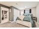 Main bedroom with neutral tones, carpet, built-in storage, and a walk-in closet, offering style and functionality at 537 N 48Th Ave, Brighton, CO 80601
