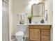 Clean bathroom featuring a vanity with storage, a mirror and a shower with glass door at 2325 S Linden Ct # 206, Denver, CO 80222