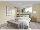Serene bedroom with modern decor, soft lighting, and a comfortable bed at 2325 S Linden Ct # 206, Denver, CO 80222