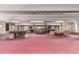 A large common area with billiard table, sofas, and various seating options, perfect for relaxation and socializing at 2325 S Linden Ct # 206, Denver, CO 80222