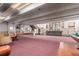 Spacious game room offering seating, a billiard table, mailboxes, and access to the stairs, fostering community at 2325 S Linden Ct # 206, Denver, CO 80222