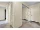 Hallway with closet and mirrored sliding doors at 2325 S Linden Ct # 206, Denver, CO 80222