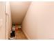 Attic featuring carpet, an angled roof, and a light at 767 Robert St, Longmont, CO 80503