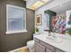 Bathroom featuring a neutral color palette and a shower with floral curtains at 15962 E Lehigh Cir, Aurora, CO 80013