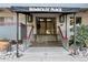 Welcoming building entrance featuring stairs, a canopy, and well-maintained landscaping at 1441 N Humboldt St # 505, Denver, CO 80218