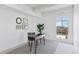 Bright office space with natural light, features a modern desk and chair with neutral carpet at 1441 N Humboldt St # 505, Denver, CO 80218