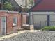 Small backyard with fence and gate, stone yard at 4536 Beach Ct, Denver, CO 80211