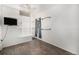 Bright bedroom with ample shelving, closet rods and a window bringing in natural light at 4536 Beach Ct, Denver, CO 80211