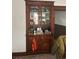 A built in cabinet with many glass decor items at 4536 Beach Ct, Denver, CO 80211