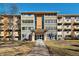 Front entrance of a two-story apartment building at 650 S Clinton St # 6D, Denver, CO 80247