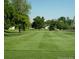 Picture of a lush green golf course, with manicured fairways and mature trees at 650 S Clinton St # 6D, Denver, CO 80247